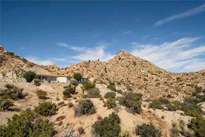 Five acres of boulders, the home and the cabin.  What a location!
