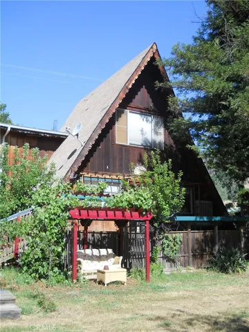 Front of house with arbor