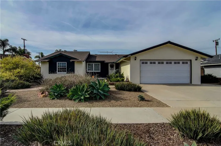 Professionally designed landscape is water wise...and offers gorgeous street appeal.