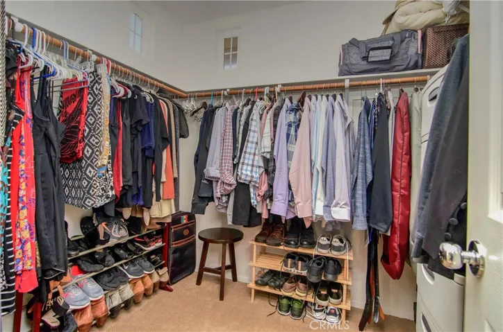 Time to go shopping.  Enjoy this extra large, master walk-in closet.