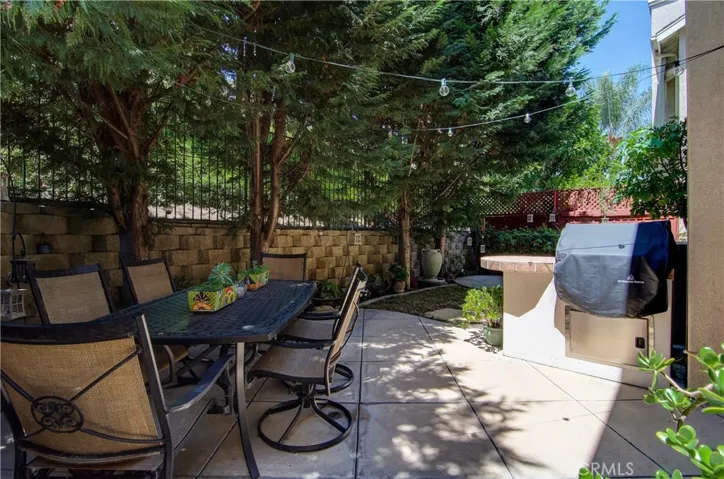 Ready to dine al fresco in this private backyard?