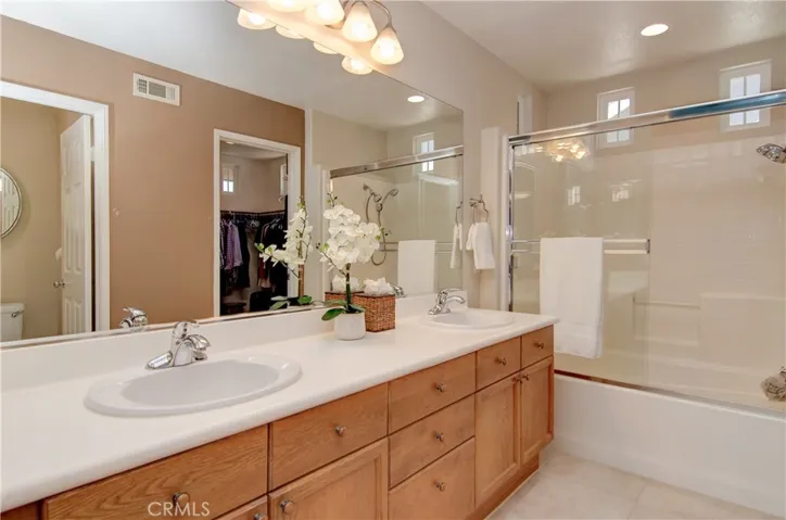 Dual vanities in the master bath.