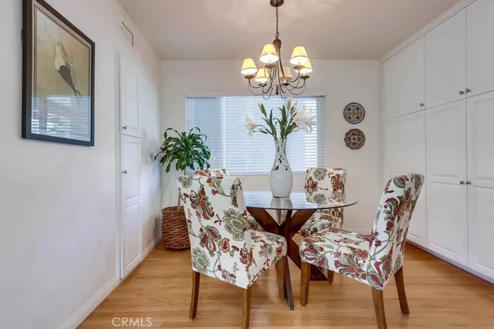 notice all the cabinets added in this eat in area of the kitchen