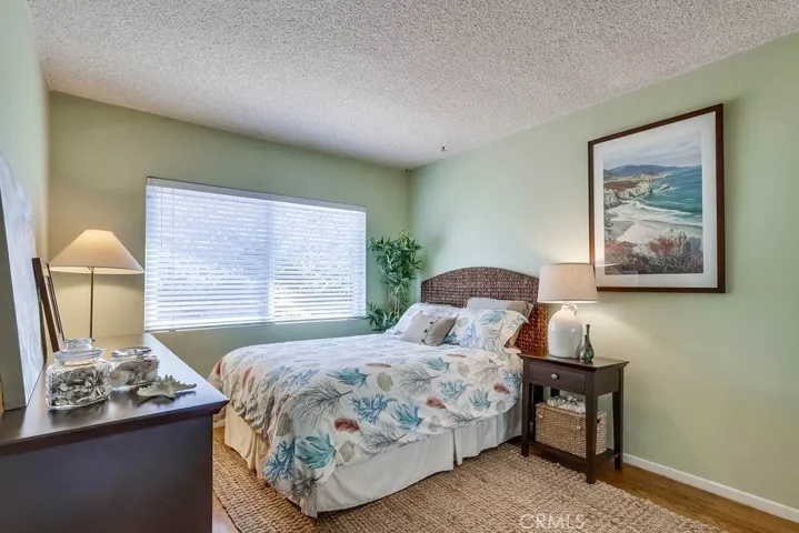 Bedroom with window facing the back yard