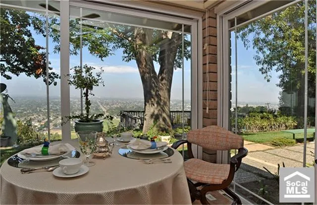 Imagine starting every day dining from this breakfast nook. Pour the Mimosa.