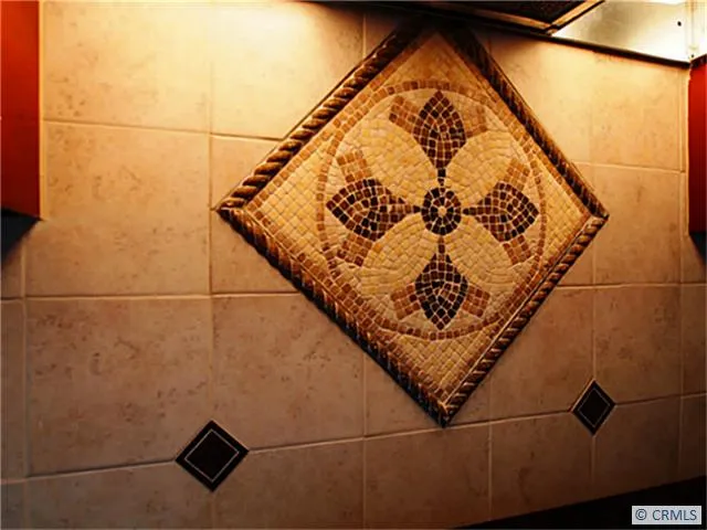 Medallion centerpiece above stove