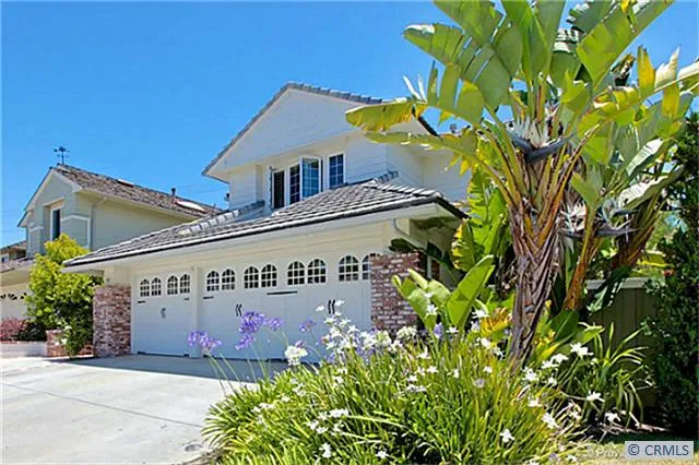 Three car garage and full driveway