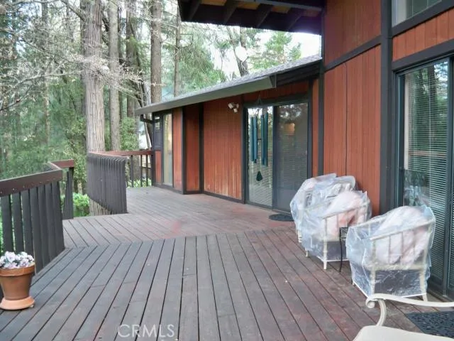Relax on 74' long deck facing the greenbelt and canyon.
