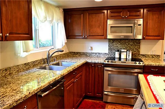Upgraded Kitchen with Frigidaire Stainless Steel Appliance