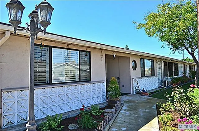 ALMOST FULLY EXPANDED UNIT BOASTS INVITING COVERED PORCH