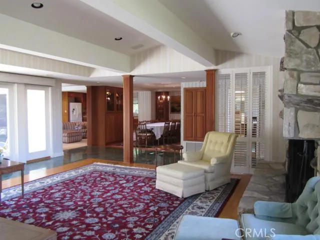Livingroom with open floor plan to diningroom, family room, and  kitchen.