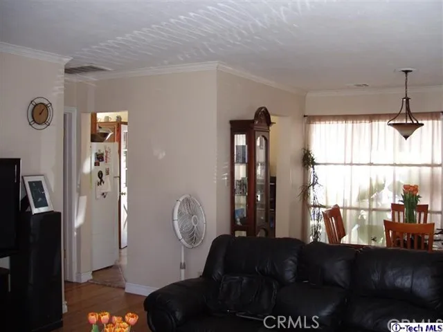 View of living room as you enter house.