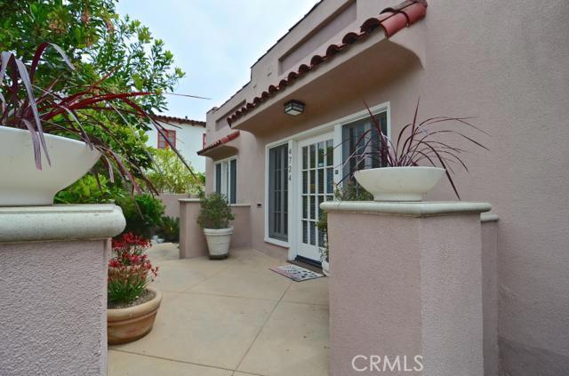 Entry courtyard is welcoming and offers privacy from street