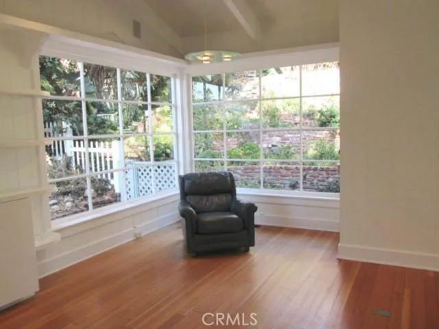 This is a perfect corner of the family room from which to enjoy a good book or watch a classic movie.