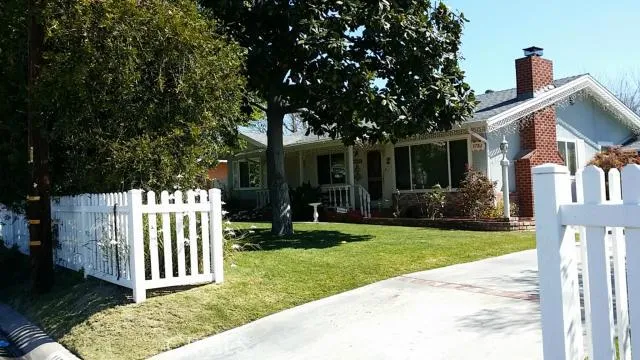 Step back in time to this home set well back form the St. and shaded by mature trees!