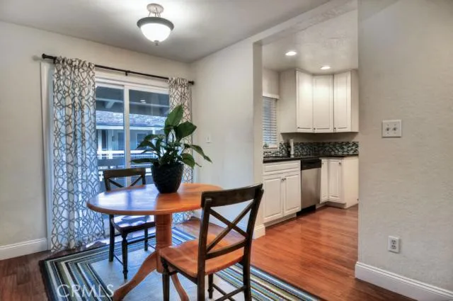 Dining room with large sliding doors which open to 1 of 2 massive balcony's.