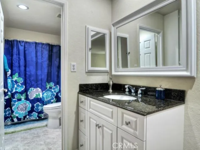 New matching vanity, medicine cabinet and mirror.