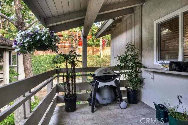 Front balcony, plenty of room for bbq, coffee, or reading the paper.