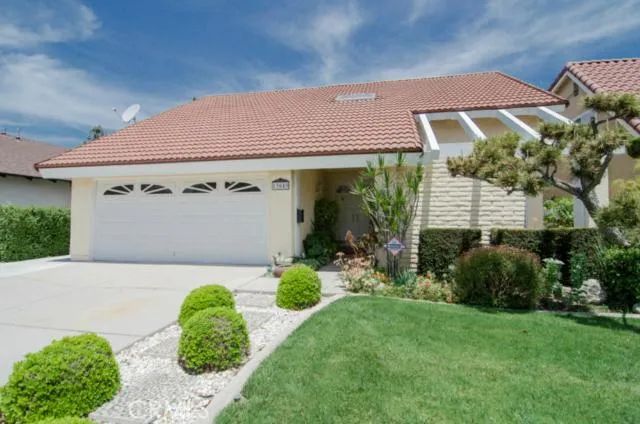 Beautiful front yard landscaping welcomes you right in