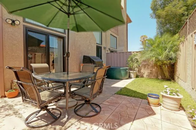 Welcome to 2707 Vanderbilt #3- lovely private patio for summer entertaining and enjoying your own personal garden.