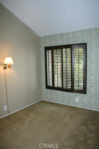 BR 3 - Another large upstairs bedroom also with vaulted ceilings
