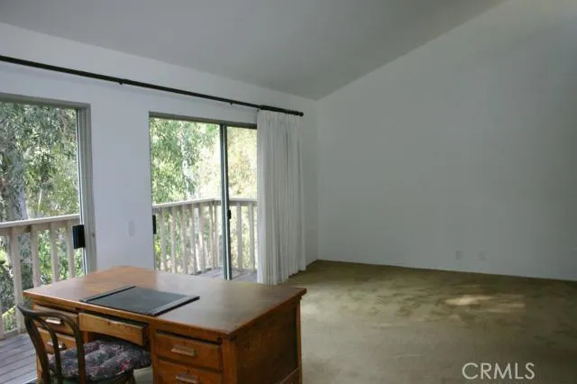 Master bedroom looking to sleeping area from the sitting area
