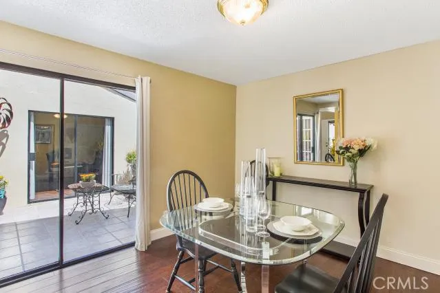 Separate dining room with view of outside atrium/private patio area