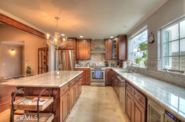 Brand new kitchen! Oversize island, high-end appliances, new cabinetry, wine fridge and more!
