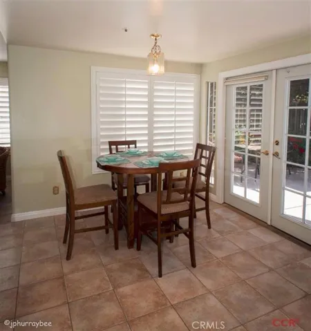 Breakfast nook off kitchen. French doors leading out to the backyard.