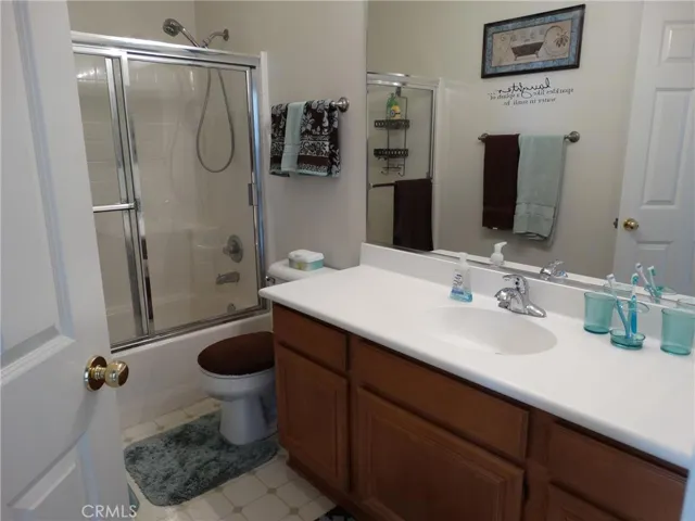 Main bathroom in hallway next to 2nd and 3rd bedrooms.
