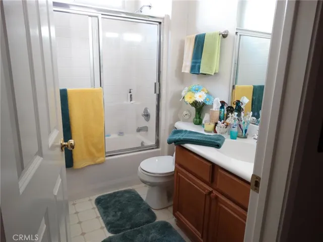 Bathroom at the from of the house next to 4th bedroom and near living/dining areas which is great for guests when entertaining.