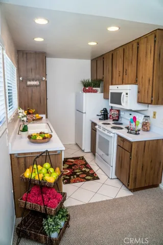 Refrigerator, Range, Microwave, Dishwasher included.