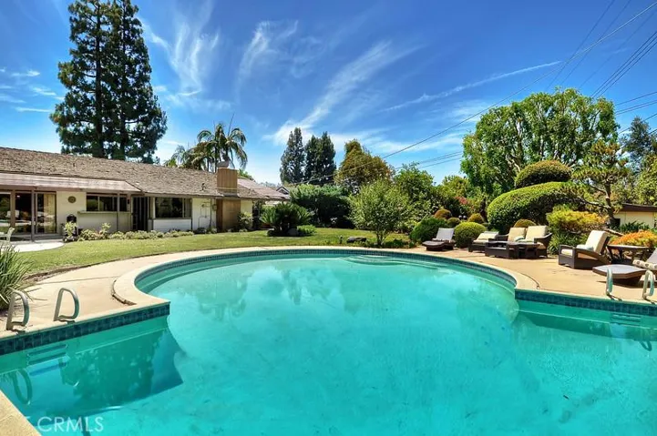 Welcome Home to 8149 San Lucas Drive, located in the prestigious Friendly Hills.