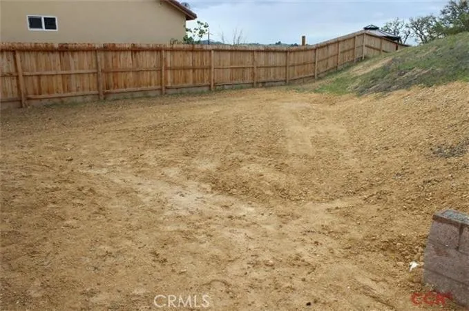 Bring your creative touch to this backyard space.