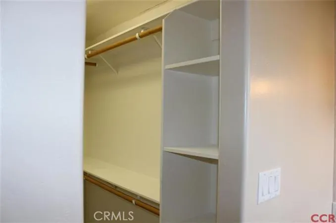 Walk in closet in master bedroom