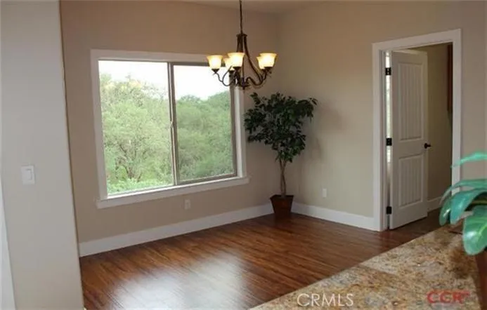 Dining nook with great view of green space!