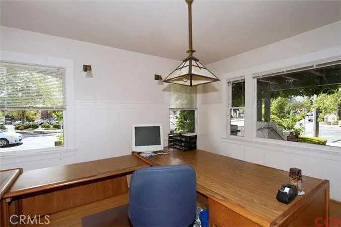 Downstairs office facing Johnson Avenue and Marsh Street.