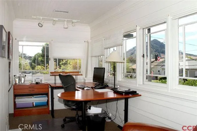 Upstairs corner office with mountain views.