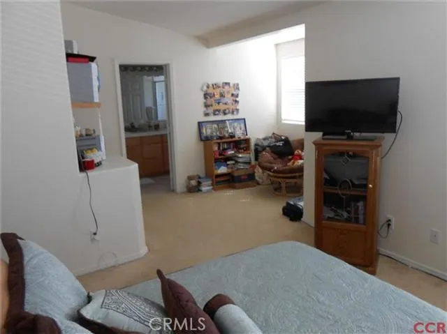 Another view of master bedroom with sitting area.
