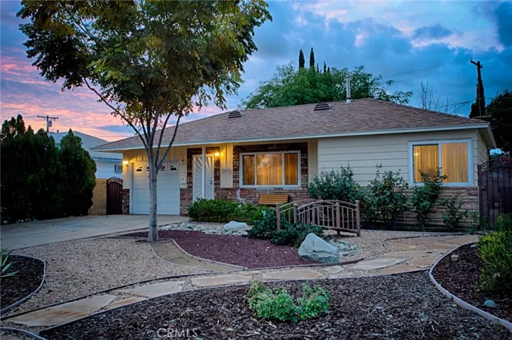 Beautifully and tastefully landscaped with drought tolerant plants and hardscape.  This turnkey home is fully upgraded and ready to move into.  The layout and utilities are in prime form for a nice room addition.