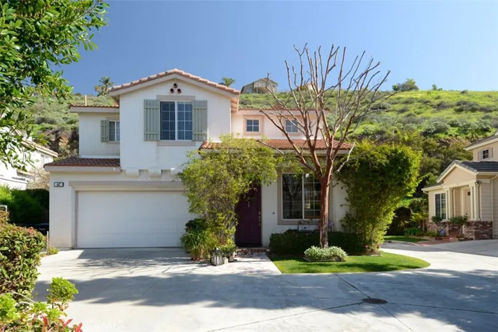 Front of the house, extra parking to the left by the berry patch