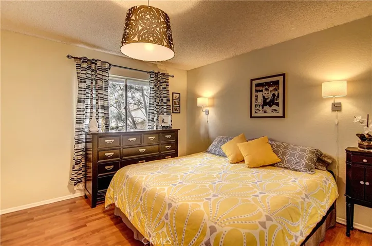 Sunny Master Bedroom with serene views of trees... Not a neighbor in sight.. oh the PRIVACY!