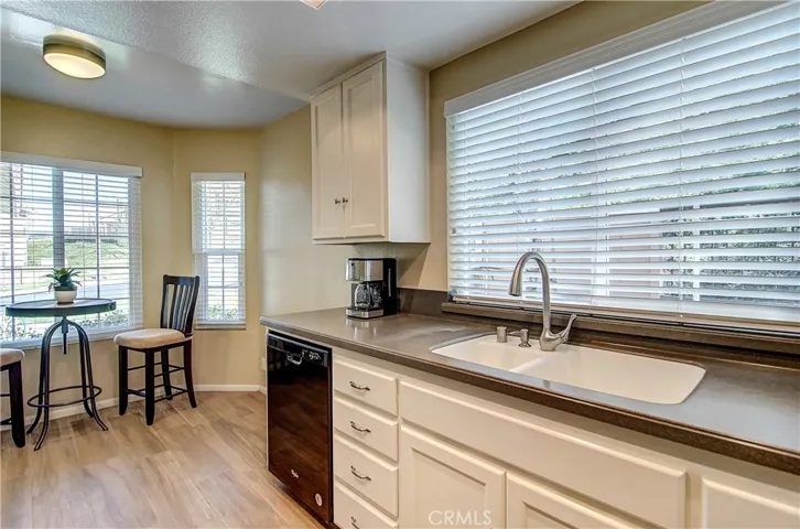 Check these off your list: #1, Kitchen sink with a Picture Window that looks onto Private Greenbelt.
#2:  Bay Windowed Breakfast Nook.