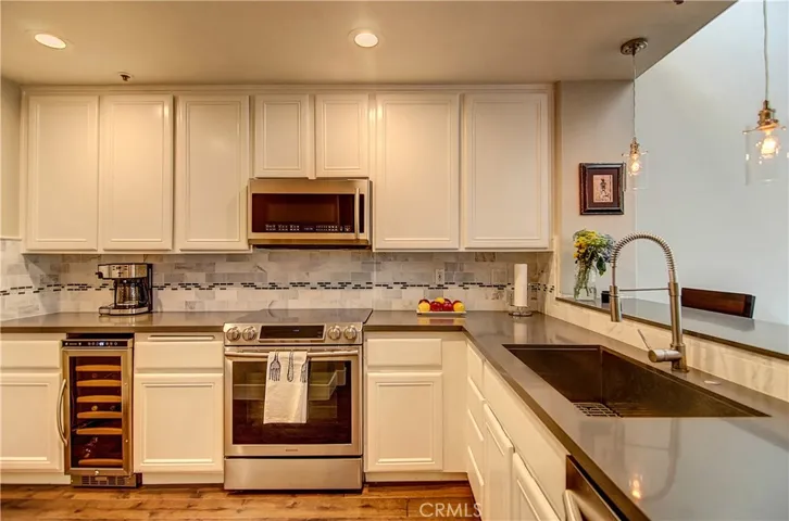 Amazing Kitchen has it all.. Acres of counter space and cabinet storage galore.