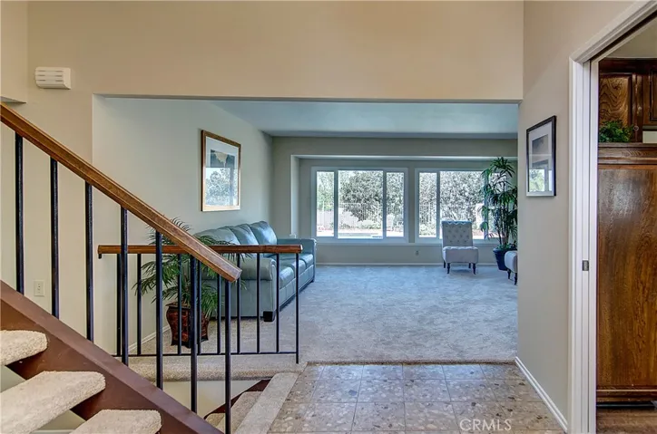 Entry foyer is a great place to greet guests, plus has cool terrazzo flooring.