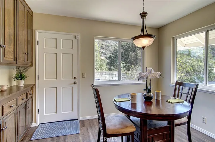 Outside door provides great access to side yard BBQ area, plus easy transition from kitchen to pool area.