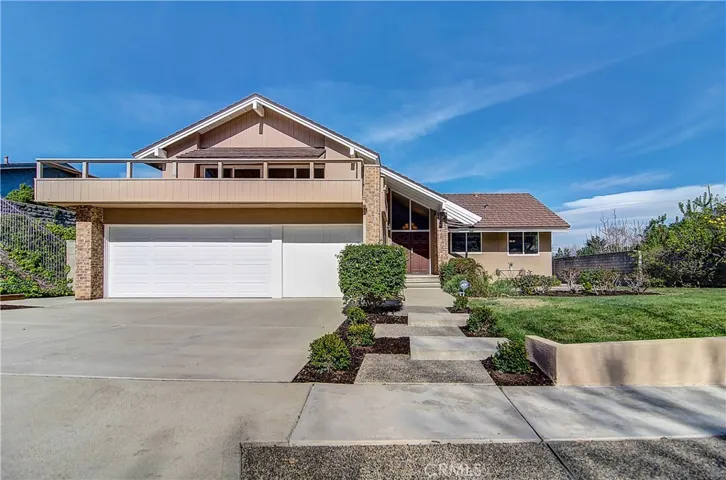 Iconic California Architecture  sets the tone for this TRUE FAMILY HOME.