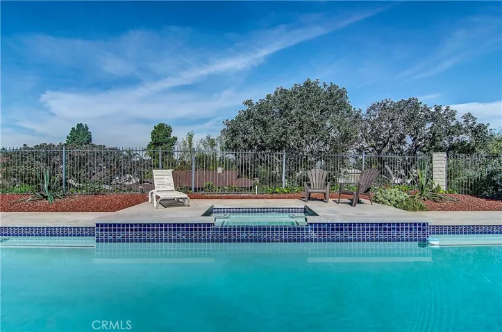 Stunning Location on a single loaded Cul-de-sac Street with panoramic views of spacious yard with huge pool/spa plus valley lights and  snowy mountain tops beyond!