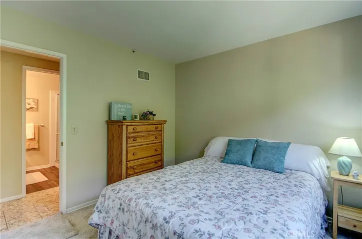 Main level bedroom is perfect for teenager, inlaw, guests...or would be great home office...bath is just across the hall.