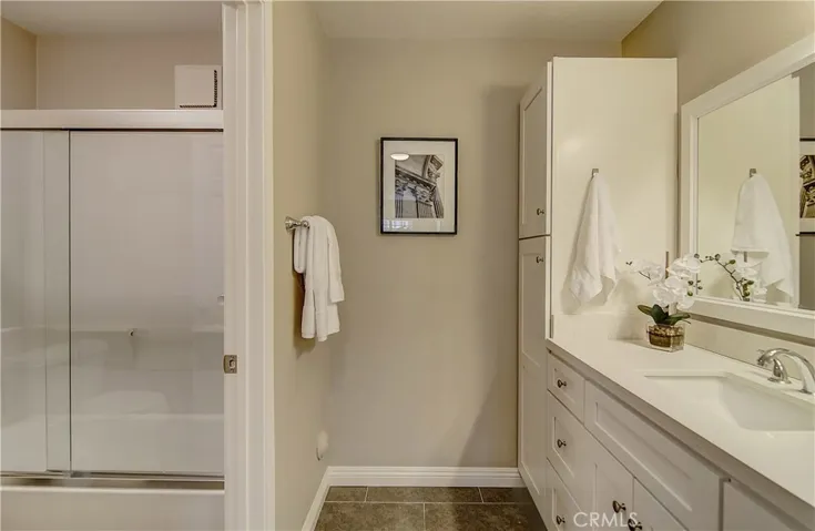 Gleaming master bath with plenty of counter and storage space.